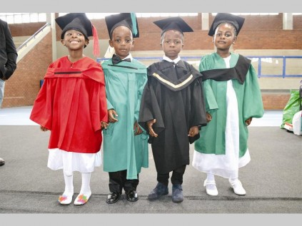 Dalsy Letsoalo, Tumisho Mabitsela, Taumpe Sebatjane and Katlego Modika in their graduation gowns.