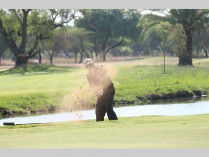 Mohammad Moosa gets out of the bunker during the Bidvest betterball challenge.