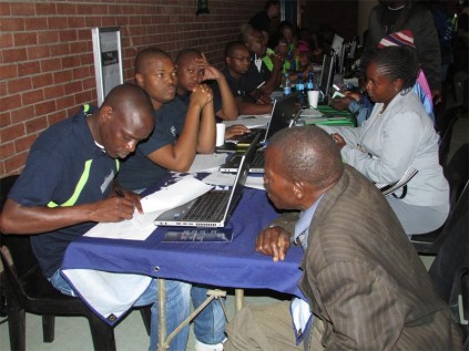 Samuel Mahumani (right) and Idah Mabunda, both from the Road Accident Fund, assist the people of Mopani with their enquiries and claims.