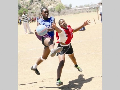 Lucy Kudumela of Air Stars Netball Club (in blue) shows her ability on the court against Zelda Moja of Moletjie Sweepers during their qualifying match for the Mayoral Cup on Sunday.