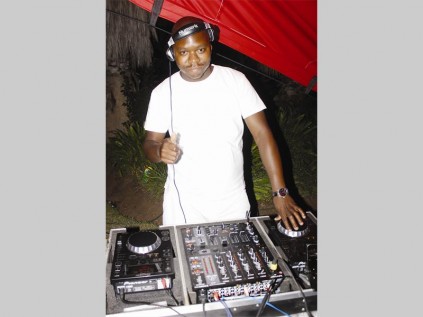 DJ Lele entertains people with his mixing skills during the all white party at Airport Africa Lodge in Polokwane on Saturday.
