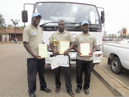 Dzunisani Zitha (middle) is the provincial winner of the Road Traffic Management Cooperation competition. With him are Lucky Mhangwana, who came second at district level in the rigid trucks category and Godfrey Baloyi, who won at district level in the articulated trucks category.