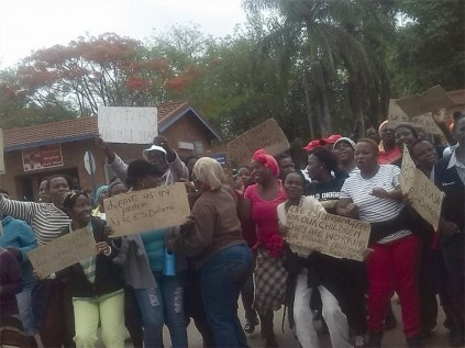 Angry health workers protest against the suspension of occupational therapist Manana Nkuna.